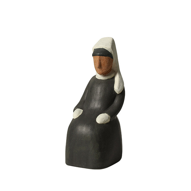 Modern hand-painted abstract figurine in coarse sand ceramic