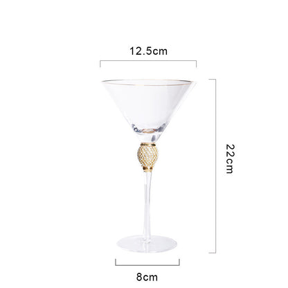 Elegant glass stemmed cup with diamond inlays and gold trim